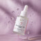 LOVOAN hyaluronic acid serum bottle with dropper on a pink background
